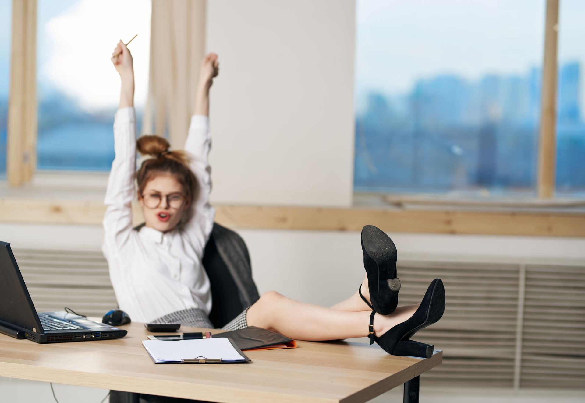 happy office business woman legs on the table happy office business woman legs on the table